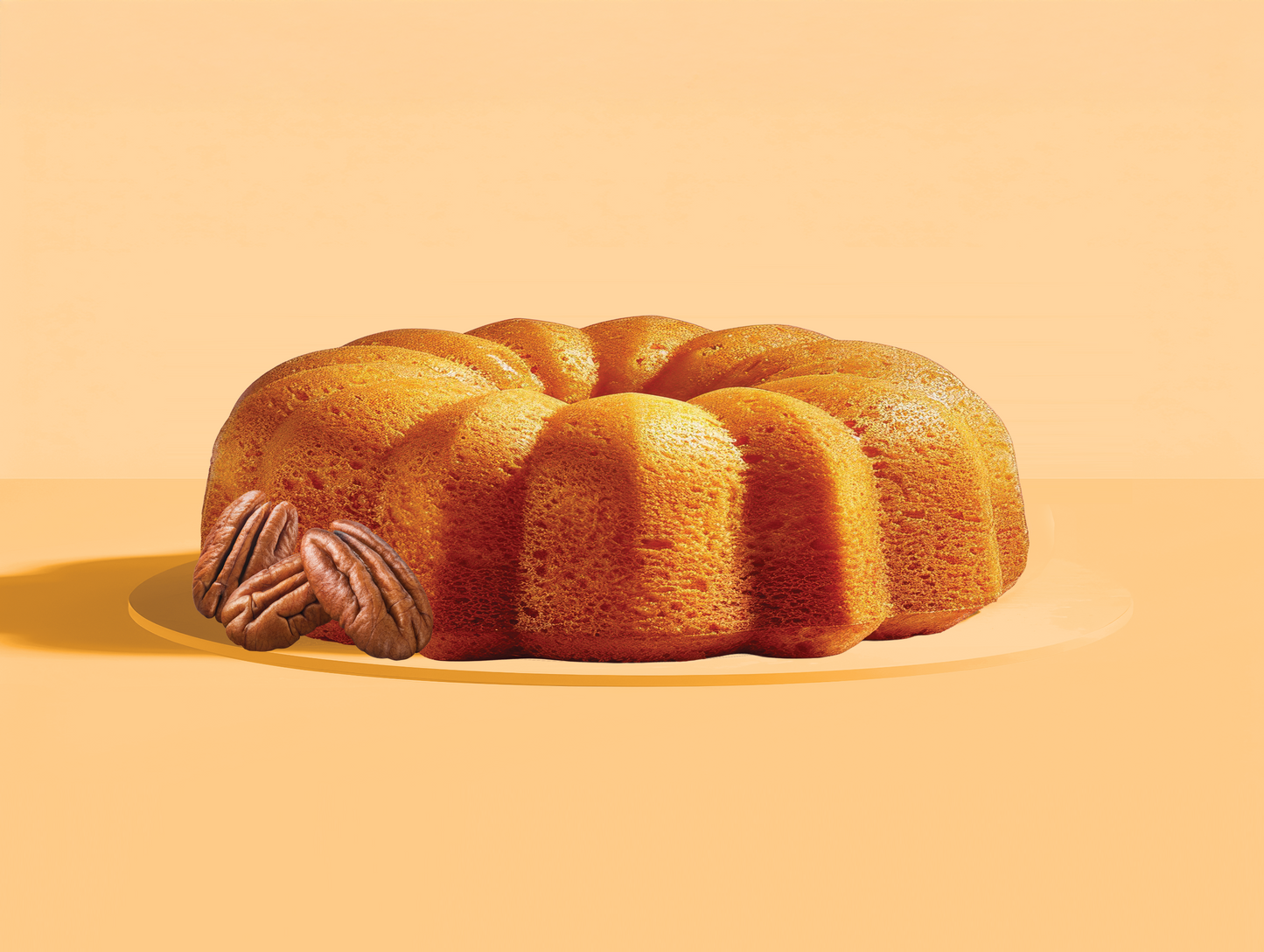 Bundt cake on a plate with a plain background